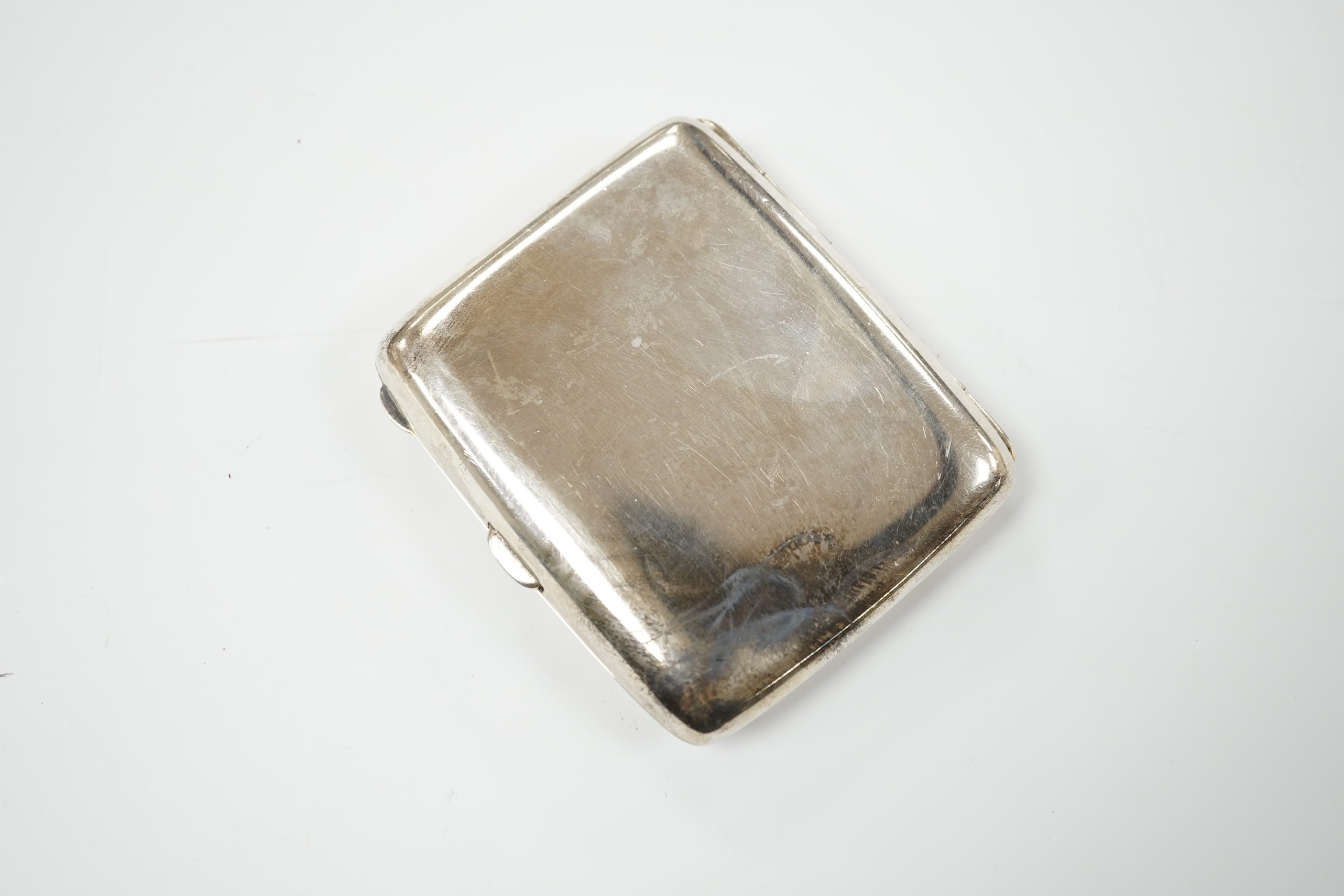 A George V silver cigarette case, Birmingham 1918, 8.5cm, 99 grams